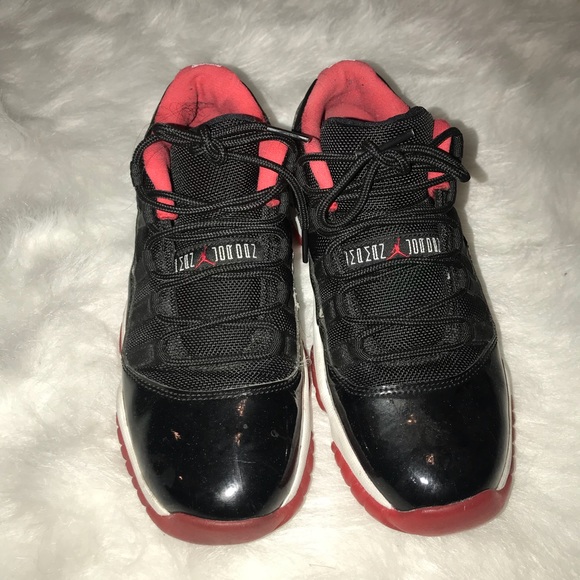 red and black low top 11s